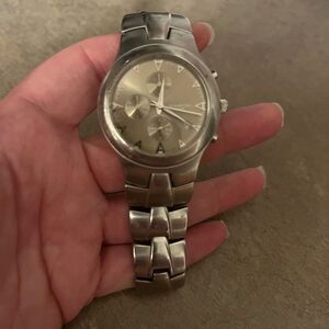 Reaction Kenneth Cole Silver Watch with Modern Bracelet Design